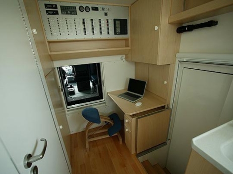 Lovely home office with a path to the front cab.